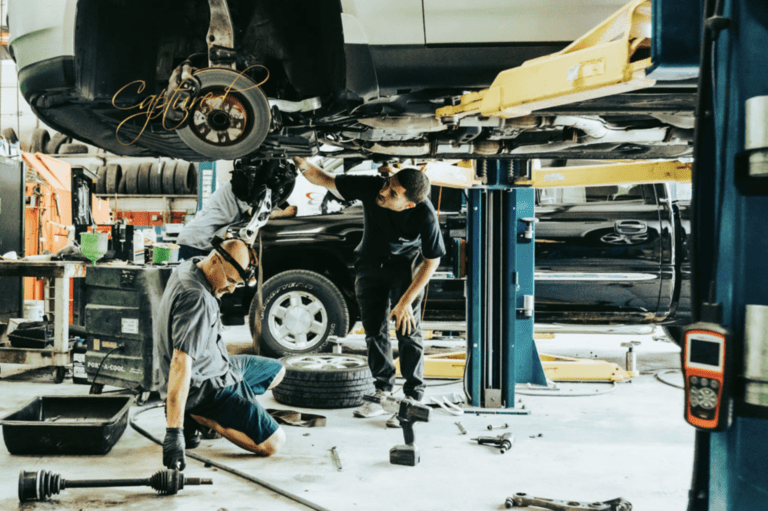 HiTech Automotive Mechanic repairing a customers vehicle