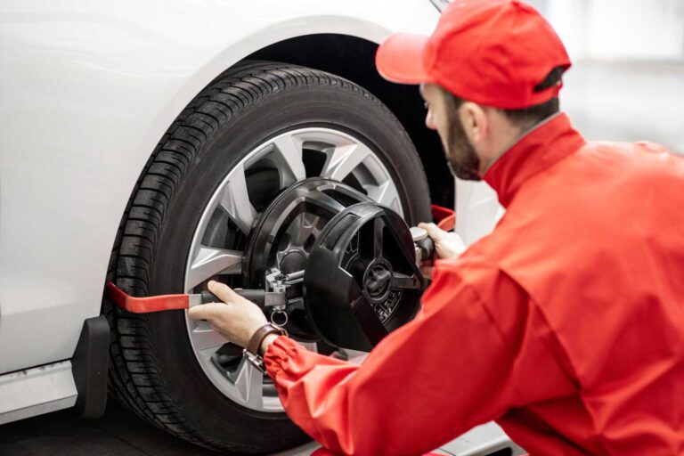 Tire Alignment Service being done by Mechanic at HiTech Automotive of Brandon, Florida